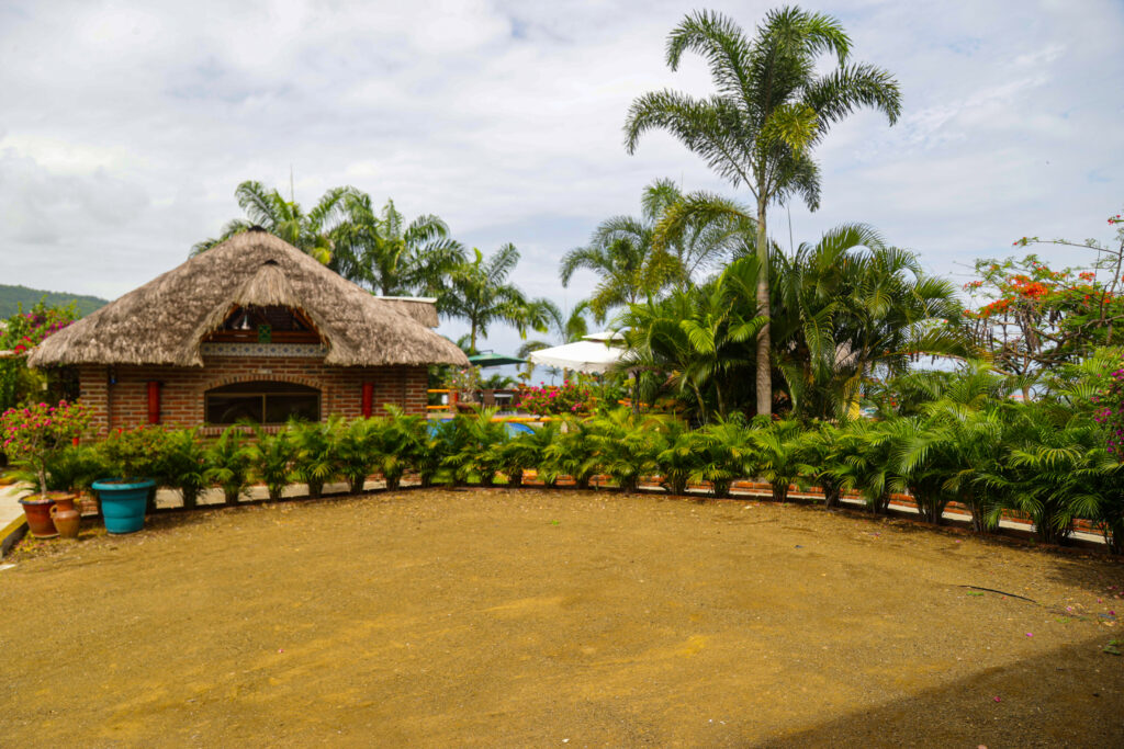 The pool equipment room and the parking area.